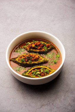 Bharwa Karela masala or stuffed bitter melon curry recipe