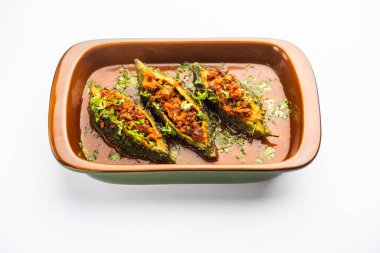 Bharwa Karela masala or stuffed bitter melon curry recipe