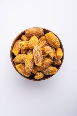 Kurutulmuş hurma veya sukha hajur veya khajoor bir kasede servis edilir, seçici bir odak noktası.