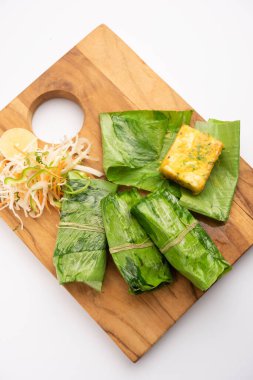 Patrani Paneer, sosla marine edilmiş, ızgara yapılmış ve yaprakla kaplanmış bir paneer.