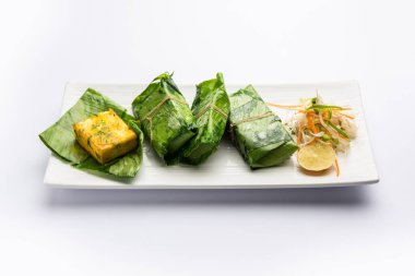 Patrani Paneer, sosla marine edilmiş, ızgara yapılmış ve yaprakla kaplanmış bir paneer.