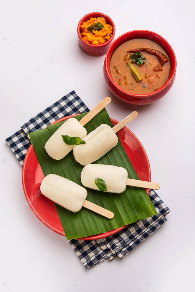 Idly lollipop or idli candy with stick served with sambar and chutney,South indian breakfast