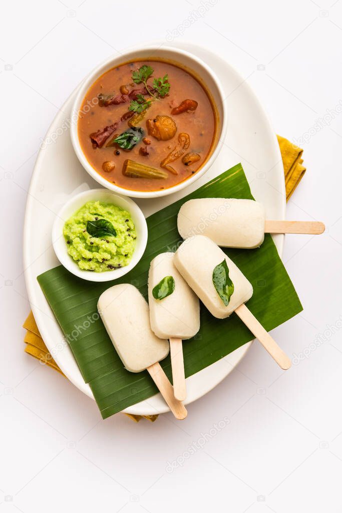 Idly lollipop or idli candy with stick served with sambar and chutney,South indian breakfast