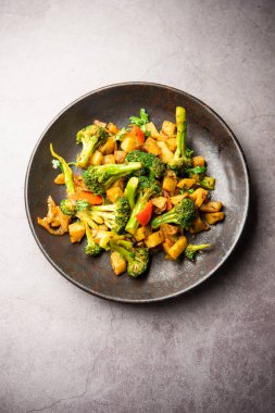 Indian style Broccoli And Aloo Poriyal or South Indian Broccoli And Potato Stir Fry vegetable recipe