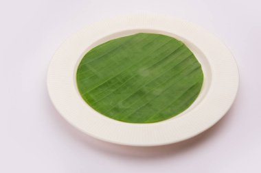 boş tabak muz yaprağı üzerinde yemek veya konu Düzenle