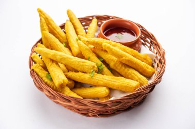 Kızarmış mısır pakoda, pakora veya ketçaplı bebek mısır böreği, Hint yemeği.