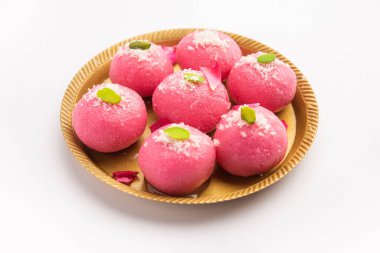 Lezzetli Pembe Chumchum veya gül aromalı cham veya Rasgulla veya Rasagola, Rosogola, Rosogolla