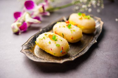 Malai Chop or Cream sandwich made using filling Rasgulla or Gulab jamun sweet is a Bengali sweet
