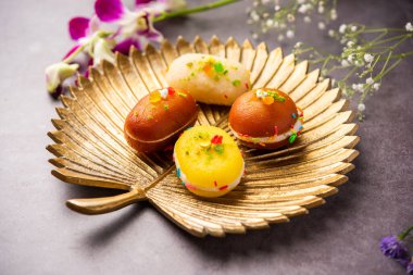 Malai Chop or Cream sandwich made using filling Rasgulla or Gulab jamun sweet is a Bengali sweet