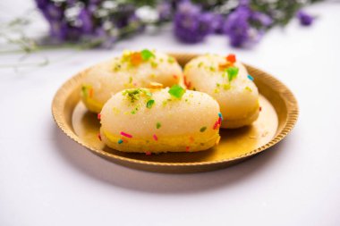 Malai Chop or Cream sandwich made using filling Rasgulla or Gulab jamun sweet is a Bengali sweet