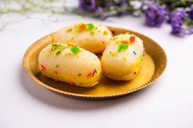 Malai Chop or Cream sandwich made using filling Rasgulla or Gulab jamun sweet is a Bengali sweet