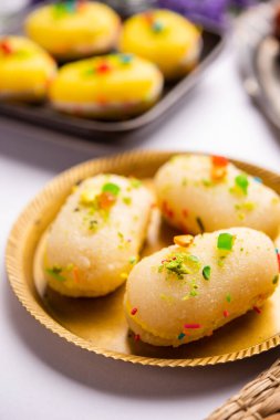 Malai Chop or Cream sandwich made using filling Rasgulla or Gulab jamun sweet is a Bengali sweet