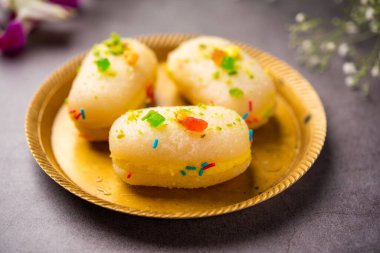 Malai Chop or Cream sandwich made using filling Rasgulla or Gulab jamun sweet is a Bengali sweet
