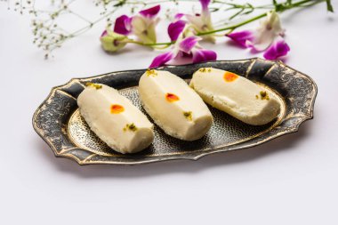 Malai Chop or Cream sandwich made using filling Rasgulla or Gulab jamun sweet is a Bengali sweet