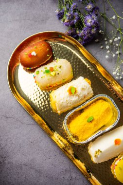 Malai Chop or Cream sandwich made using filling Rasgulla or Gulab jamun sweet is a Bengali sweet