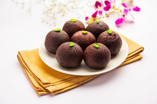 Indian Sweet Food Sweet Black Gulab Jamun Also Known as Kala Jamun, Black Jamun or Dry Kala Jam
