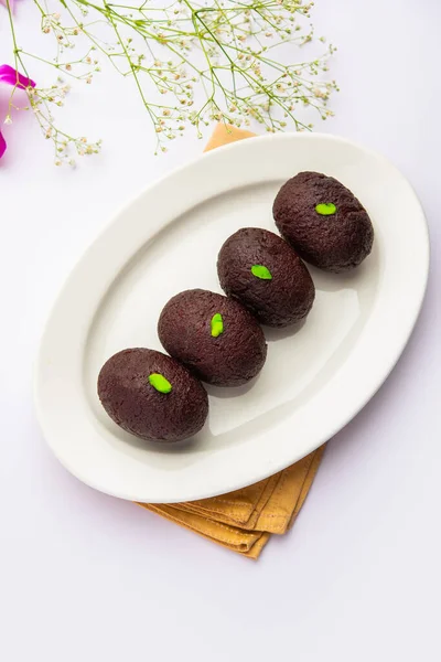 Indian Sweet Food Sweet Black Gulab Jamun Also Known as Kala Jamun, Black Jamun or Dry Kala Jam