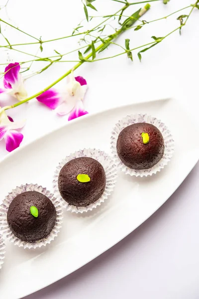 Indian Sweet Food Sweet Black Gulab Jamun Also Known as Kala Jamun, Black Jamun or Dry Kala Jam