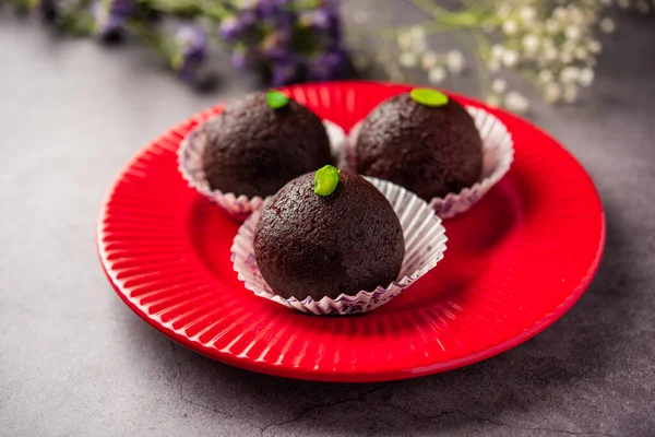 Indian Sweet Food Sweet Black Gulab Jamun Also Known as Kala Jamun, Black Jamun or Dry Kala Jam