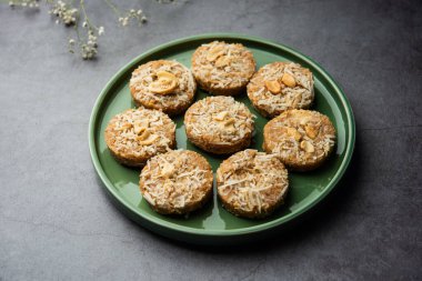 Amrit peda or Amrut pedha or pera is an Indian sweet made from milk and sugar with coconut topping