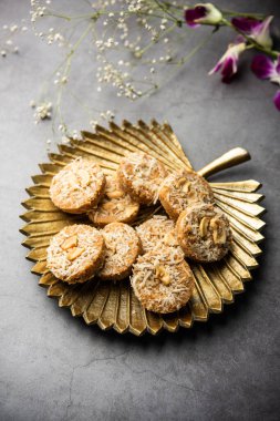 Amrit peda or Amrut pedha or pera is an Indian sweet made from milk and sugar with coconut topping