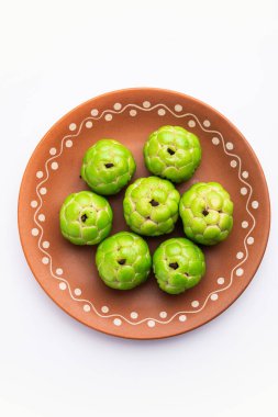 Sitafal peda or pera or custard apple shape designer sweet mithai barfi or burfi
