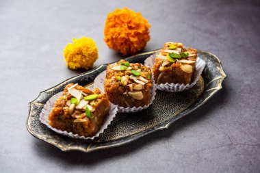 Dodha Barfi or Doda Burfi is a traditional Indian sweet, which has a grainy and chewy texture