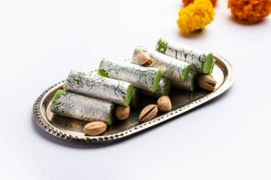 Pista Roll Or Pistachio Rolls Mithai or sigar, Indian sweet or dessert for festivals