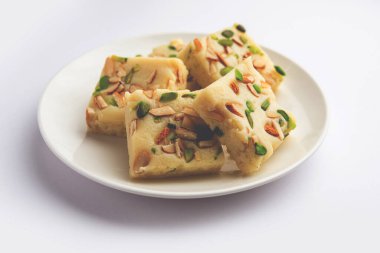 Milk powder barfi also known as Mava burfi, white Khoya burfi or Barfee, Indian Sweet food