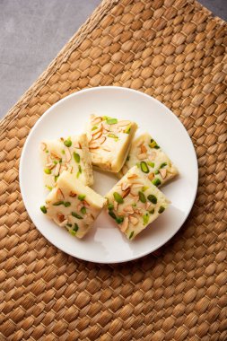 Milk powder barfi also known as Mava burfi, white Khoya burfi or Barfee, Indian Sweet food