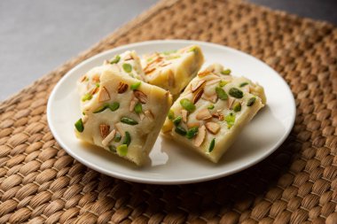 Milk powder barfi also known as Mava burfi, white Khoya burfi or Barfee, Indian Sweet food