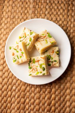 Milk powder barfi also known as Mava burfi, white Khoya burfi or Barfee, Indian Sweet food