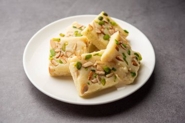 Milk powder barfi also known as Mava burfi, white Khoya burfi or Barfee, Indian Sweet food