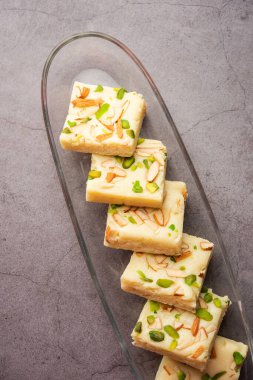 Milk powder barfi also known as Mava burfi, white Khoya burfi or Barfee, Indian Sweet food