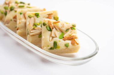 Milk powder barfi also known as Mava burfi, white Khoya burfi or Barfee, Indian Sweet food