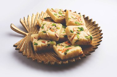 Milk powder barfi also known as Mava burfi, white Khoya burfi or Barfee, Indian Sweet food