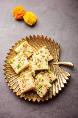 Milk powder barfi also known as Mava burfi, white Khoya burfi or Barfee, Indian Sweet food