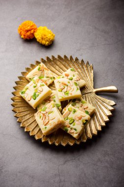 Milk powder barfi also known as Mava burfi, white Khoya burfi or Barfee, Indian Sweet food