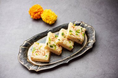 Milk powder barfi also known as Mava burfi, white Khoya burfi or Barfee, Indian Sweet food