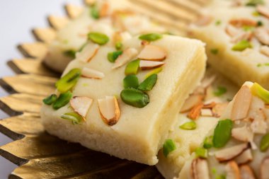 Milk powder barfi also known as Mava burfi, white Khoya burfi or Barfee, Indian Sweet food