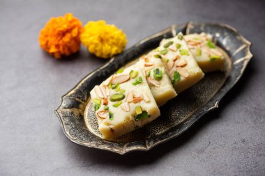Milk powder barfi also known as Mava burfi, white Khoya burfi or Barfee, Indian Sweet food