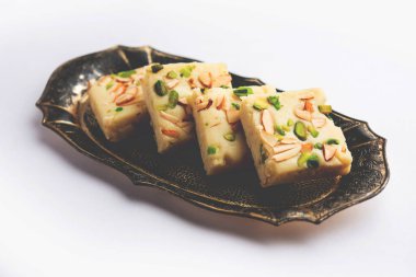 Milk powder barfi also known as Mava burfi, white Khoya burfi or Barfee, Indian Sweet food