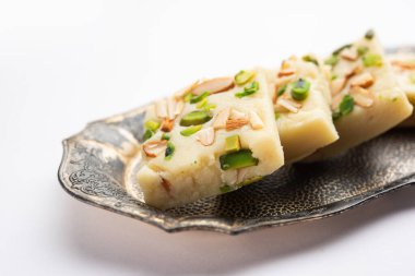 Milk powder barfi also known as Mava burfi, white Khoya burfi or Barfee, Indian Sweet food