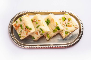Milk powder barfi also known as Mava burfi, white Khoya burfi or Barfee, Indian Sweet food