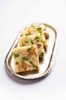 Milk powder barfi also known as Mava burfi, white Khoya burfi or Barfee, Indian Sweet food