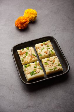 Milk powder barfi also known as Mava burfi, white Khoya burfi or Barfee, Indian Sweet food