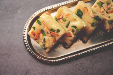 Milk powder barfi also known as Mava burfi, white Khoya burfi or Barfee, Indian Sweet food