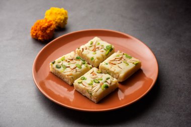 Milk powder barfi also known as Mava burfi, white Khoya burfi or Barfee, Indian Sweet food