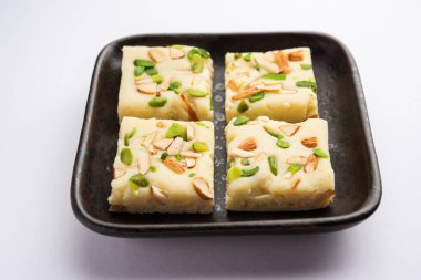 Milk powder barfi also known as Mava burfi, white Khoya burfi or Barfee, Indian Sweet food