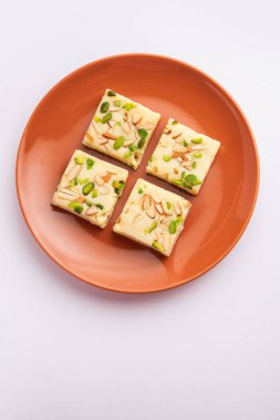Milk powder barfi also known as Mava burfi, white Khoya burfi or Barfee, Indian Sweet food